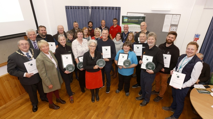 Winners of the CPRE Awards 2023 stood in a row holding certificates.